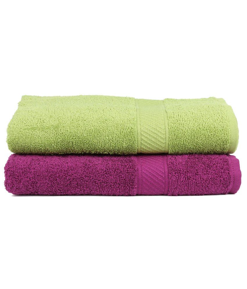 purple and green bath towels