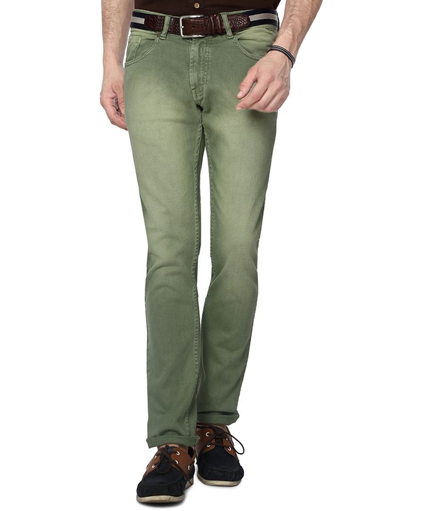 green slim jeans