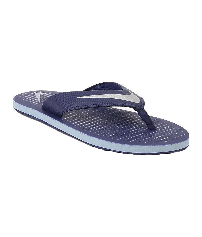 navy blue nike flip flops