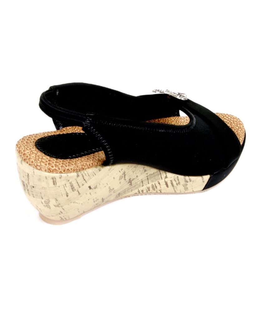 black patent heeled sandals