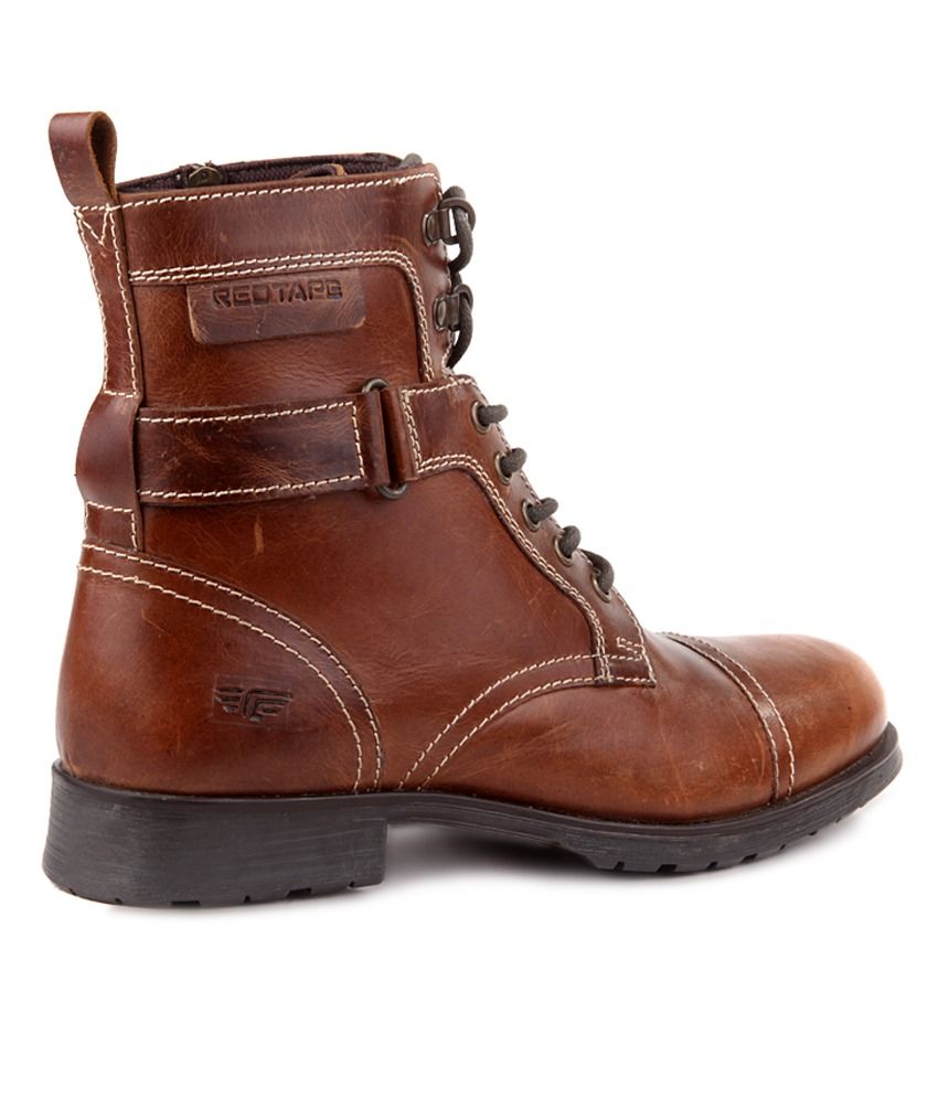tan boots with red zipper