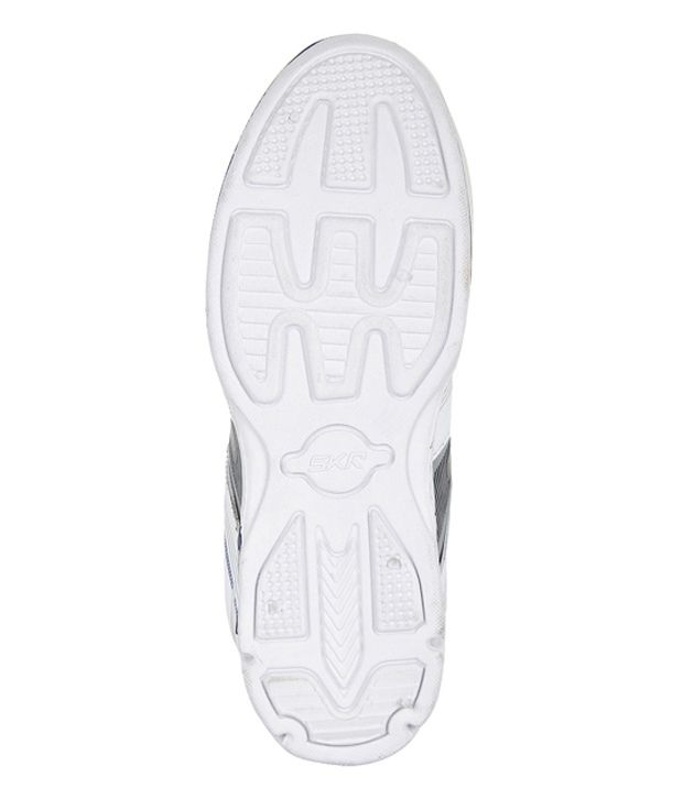 white canvas running shoes