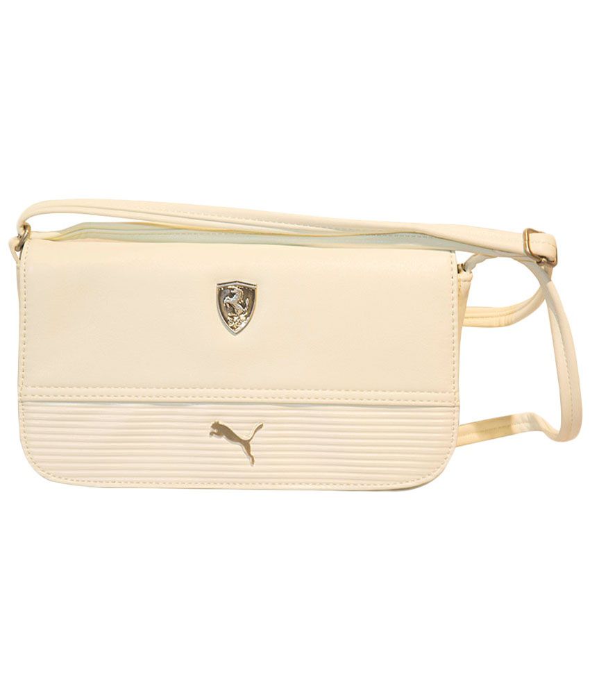 puma white and gold handbag