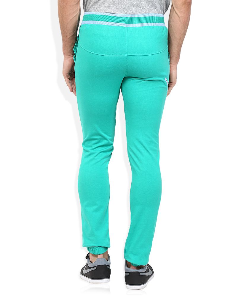 turquoise track pants