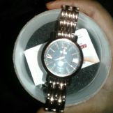 titan metal round womens watch