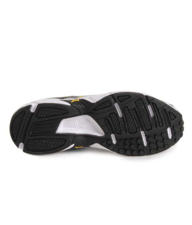 yellow and gray pumas