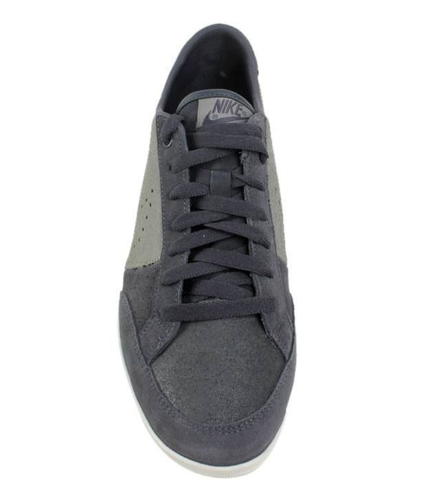 navy blue and gray nike shoes