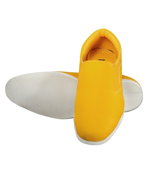 yellow slip on trainers