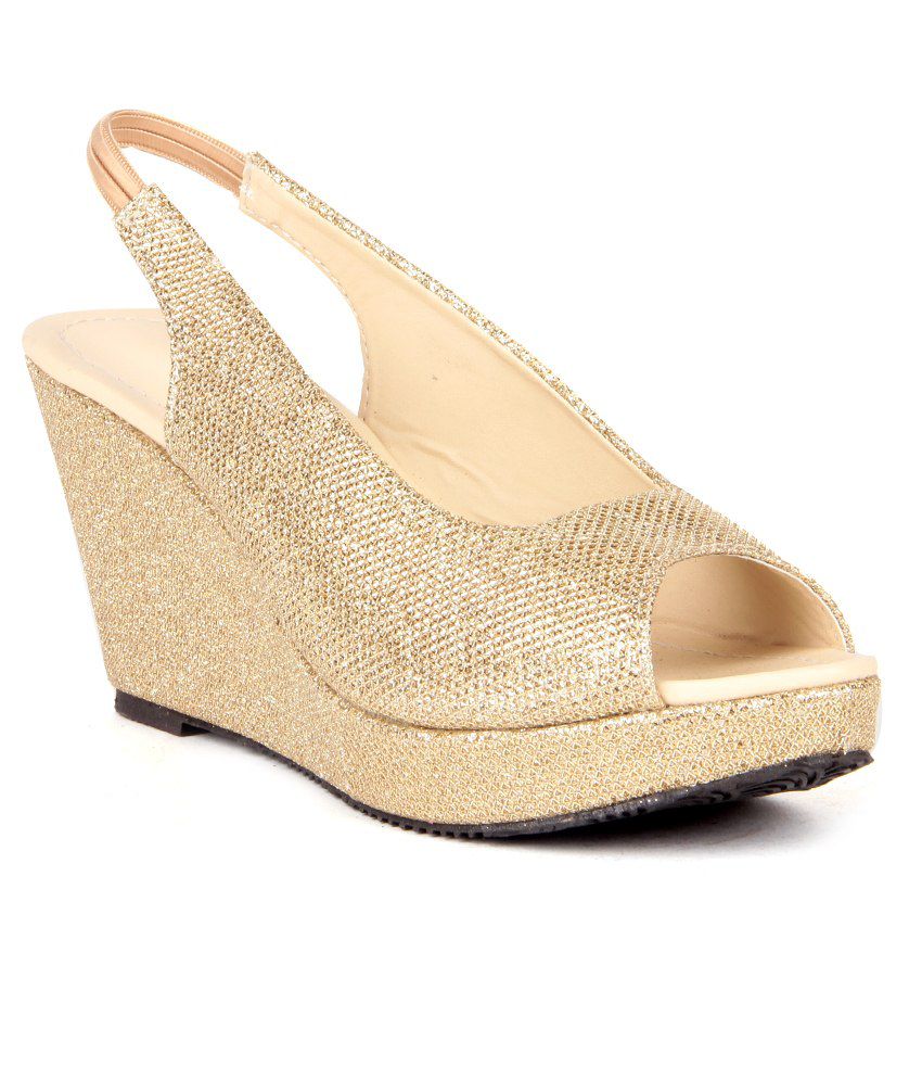    			Anand Archies Gold Wedges