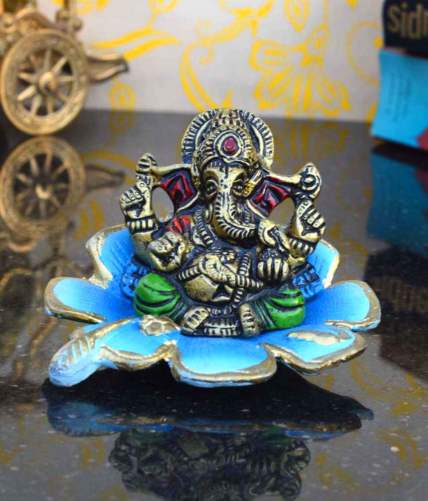     			eCraftIndia Multicolour Metal Lord Ganesha Statue On Leaf