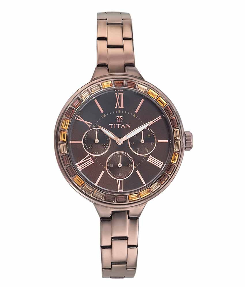 titan brown metal watch