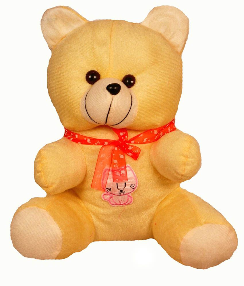 white and yellow teddy bear