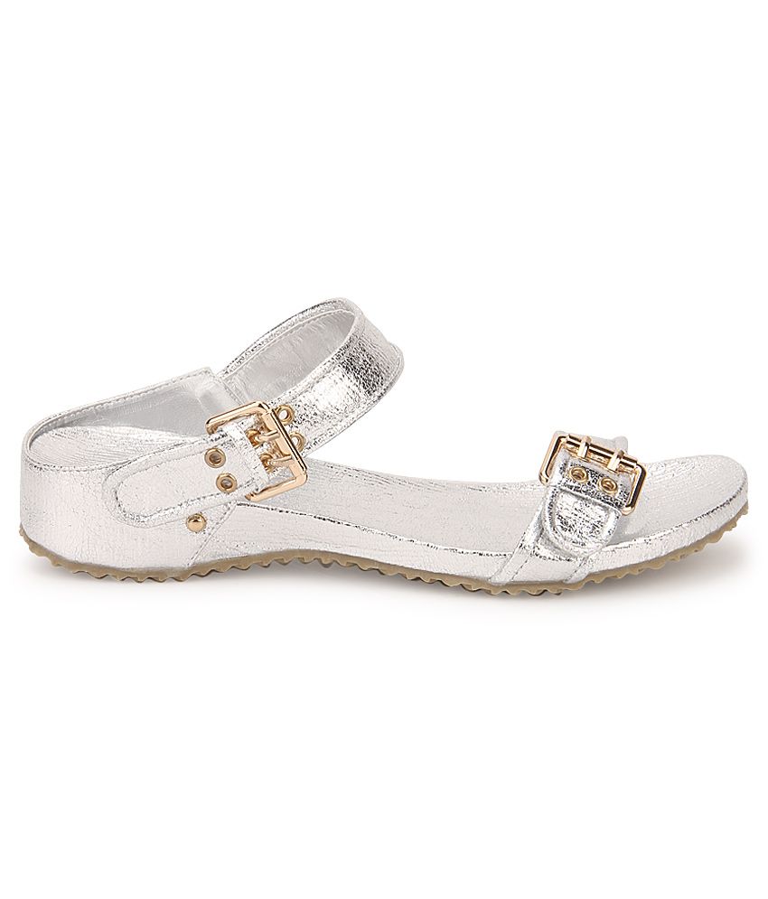 white and silver flats