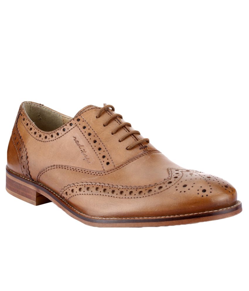 red tape tan color shoes