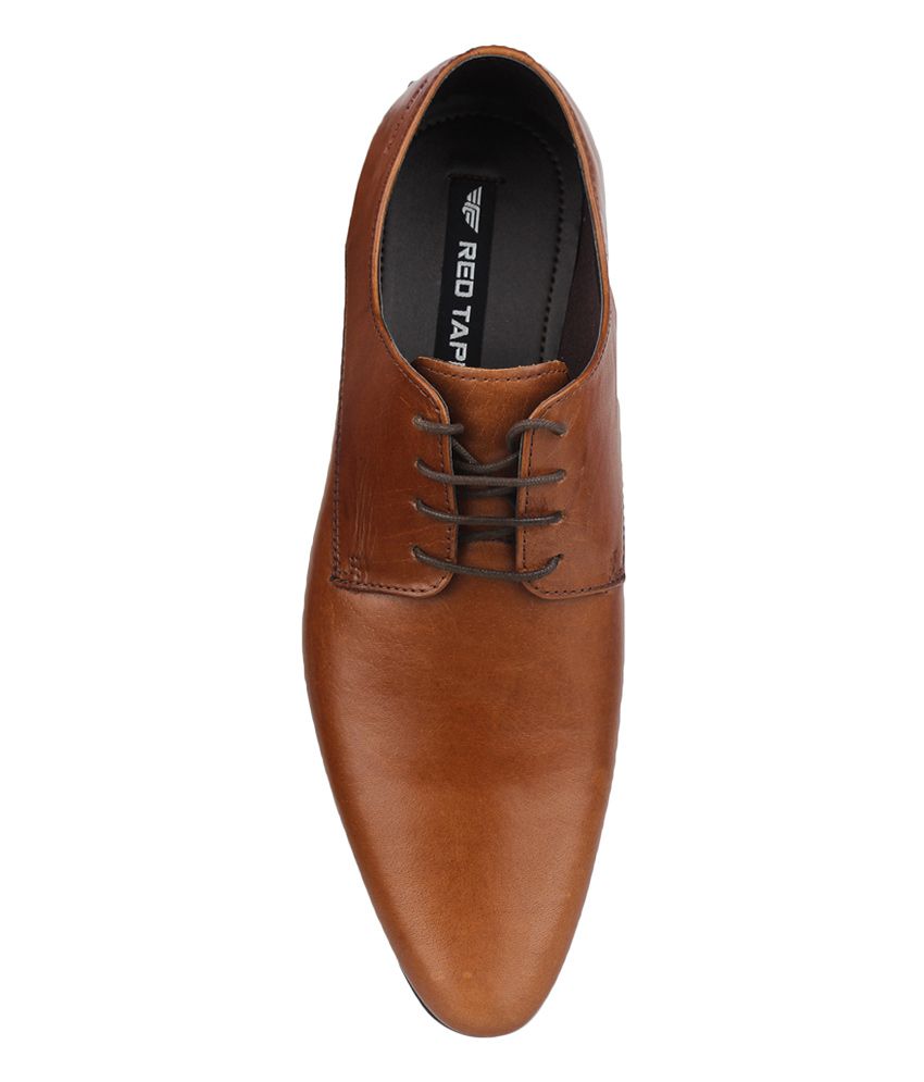 red tape tan colour shoes