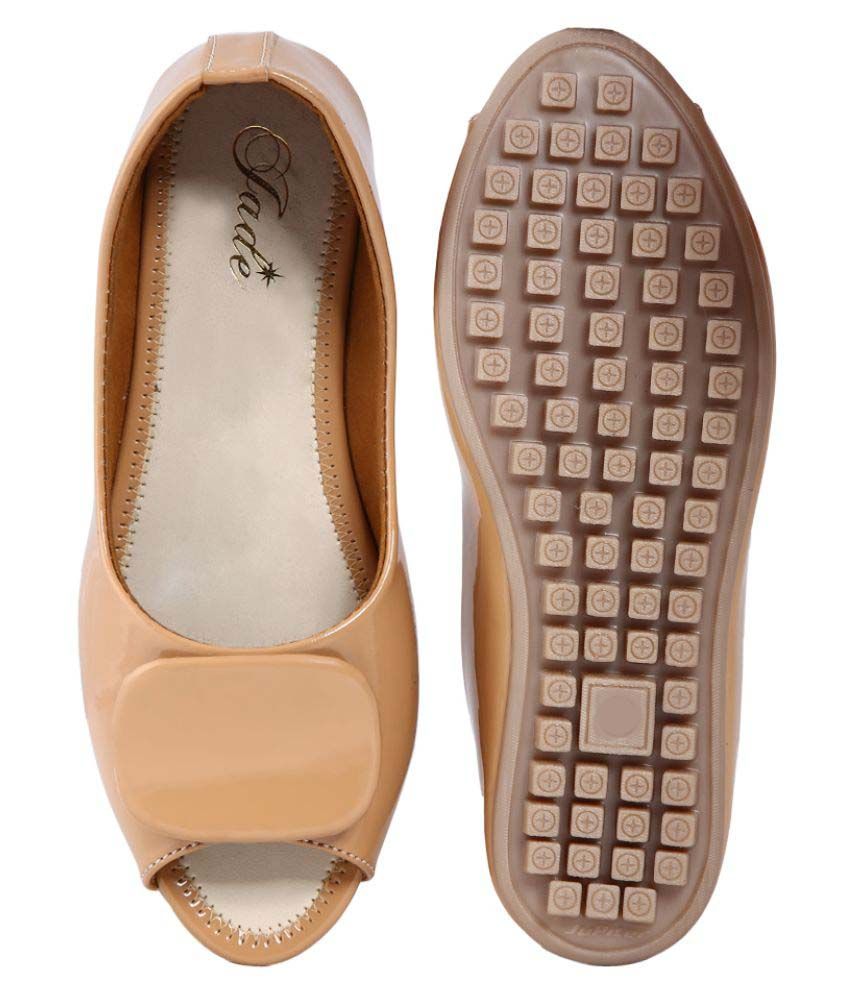 shiny tan flats
