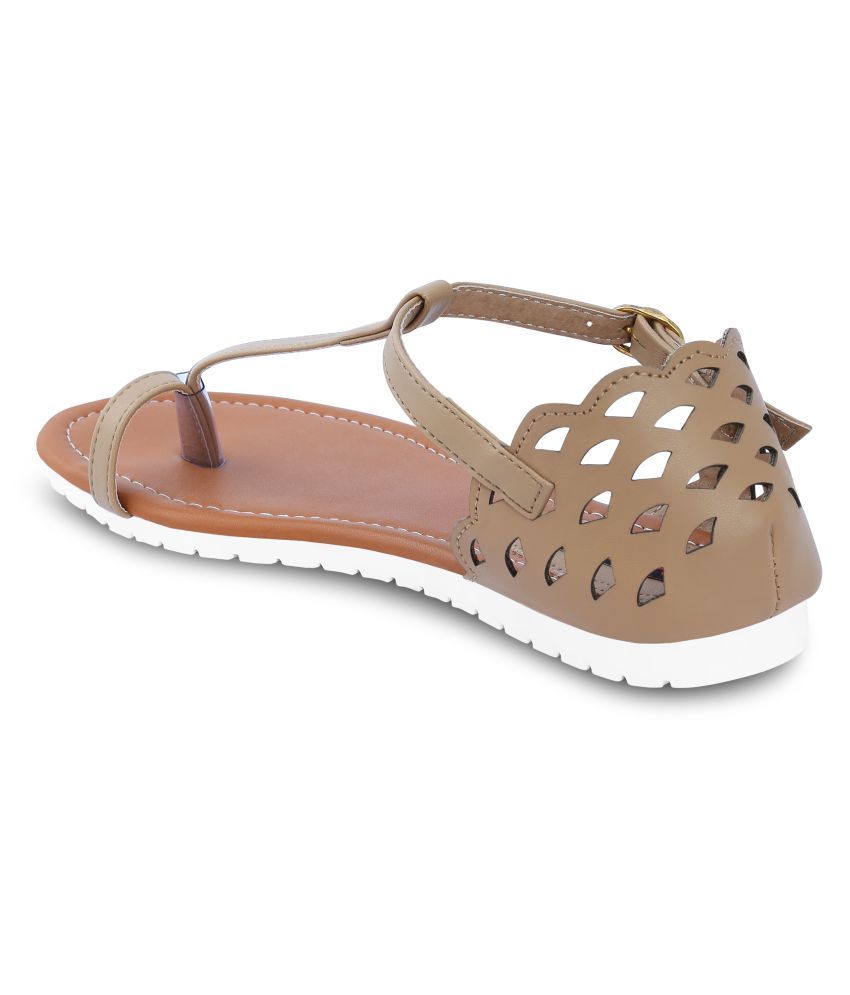 beige flats with black tips