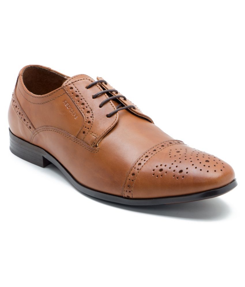 red tape tan color shoes