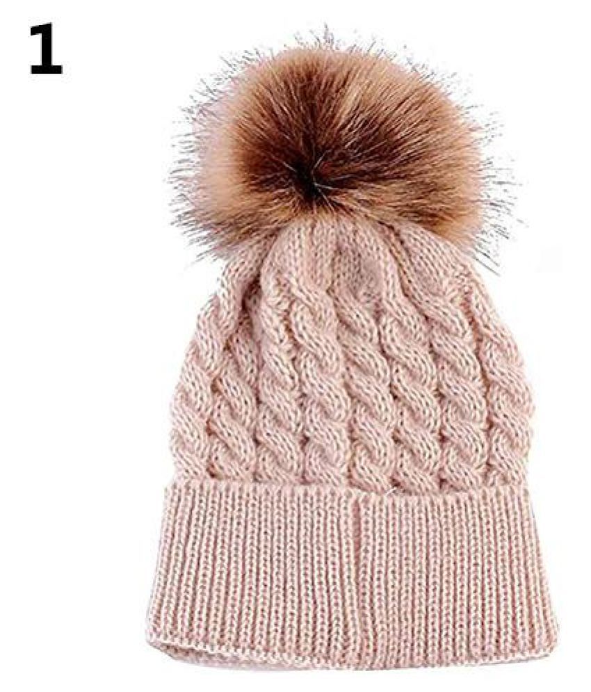 ball on top of winter hat