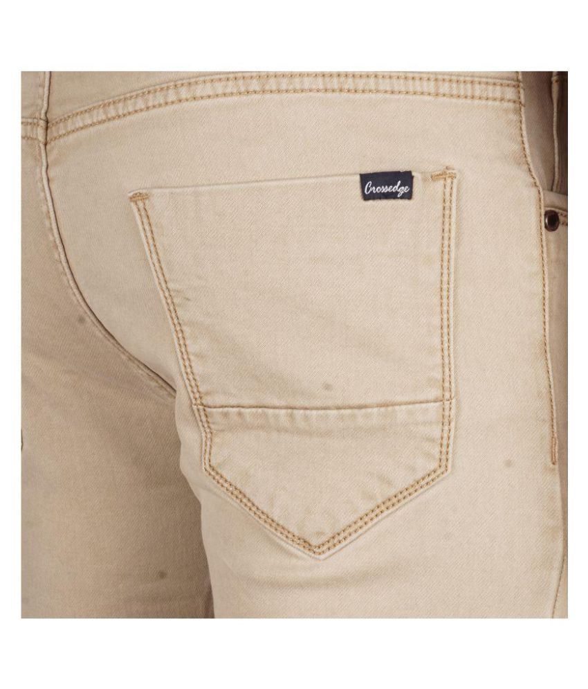 beige ripped jeans