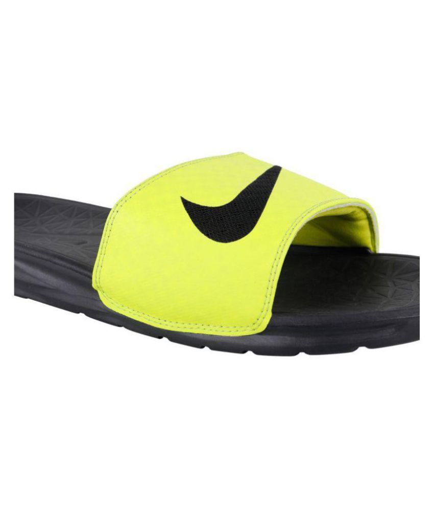yellow nike flip flops