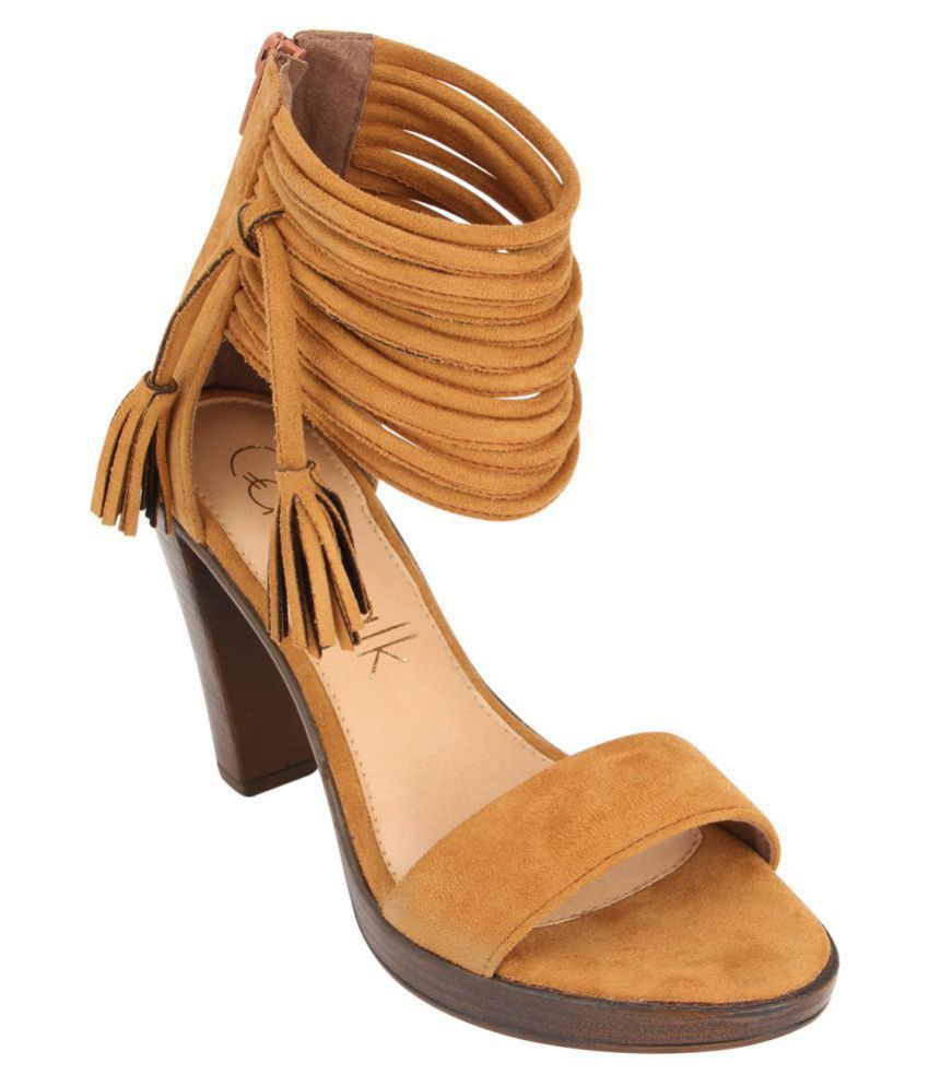 pointy tan flats