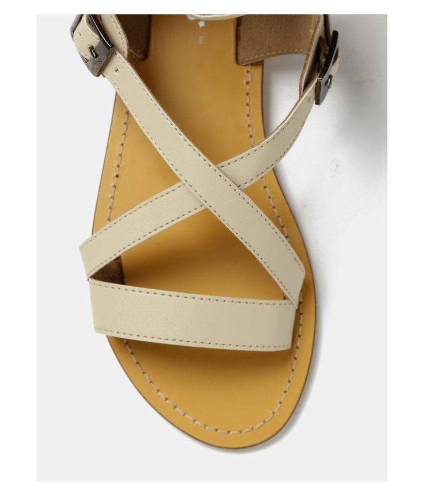 beige flats with black tips
