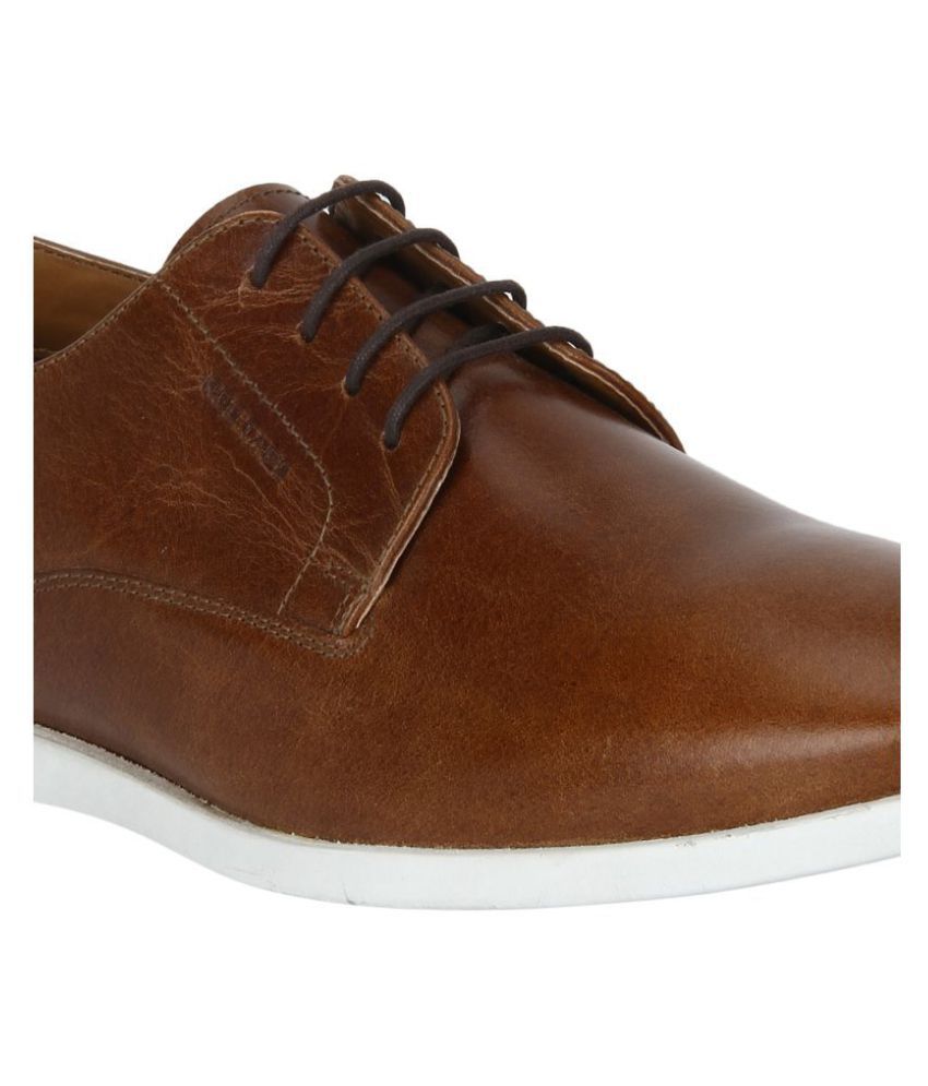 red tape tan color shoes