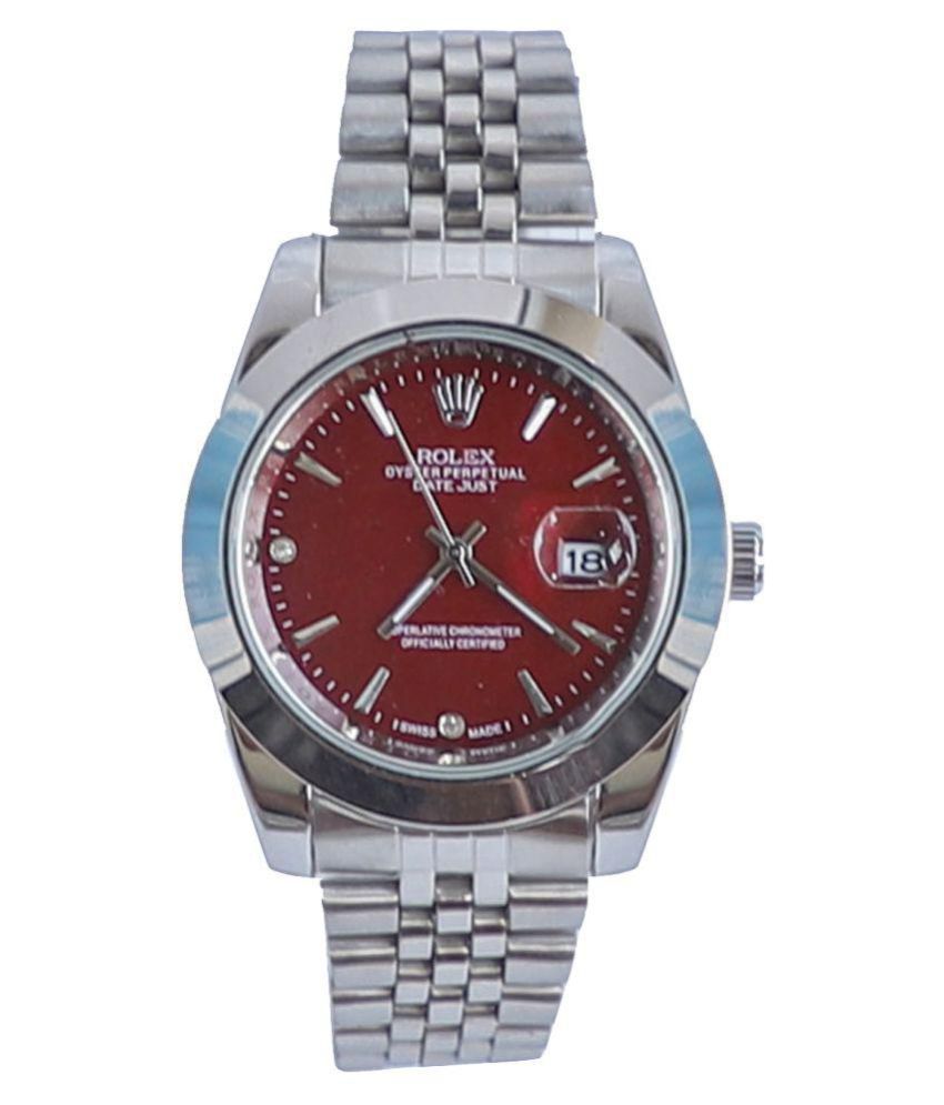 silver and red rolex