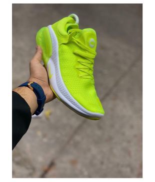 green colour nike shoes