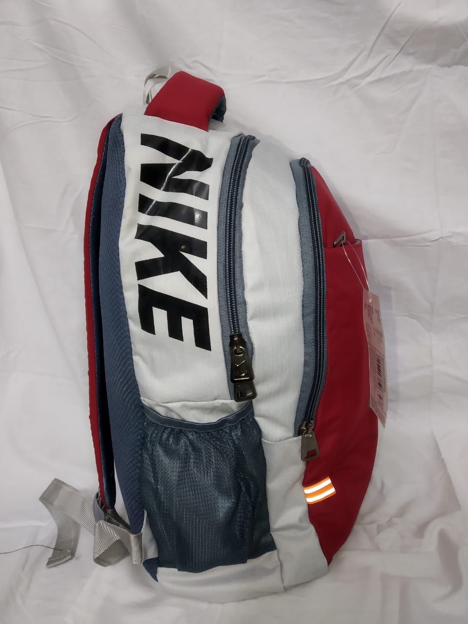 red and white nike bag