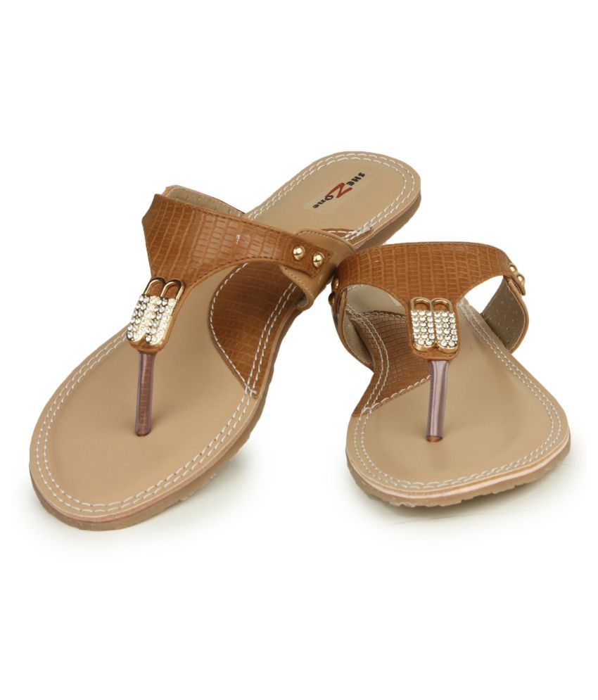 pointy tan flats