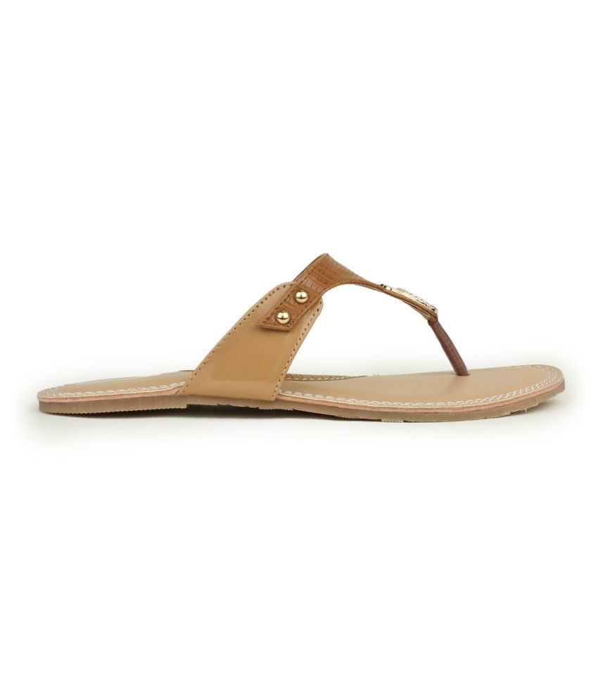 shiny tan flats