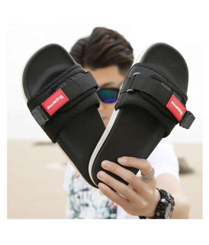 supreme flip flops black