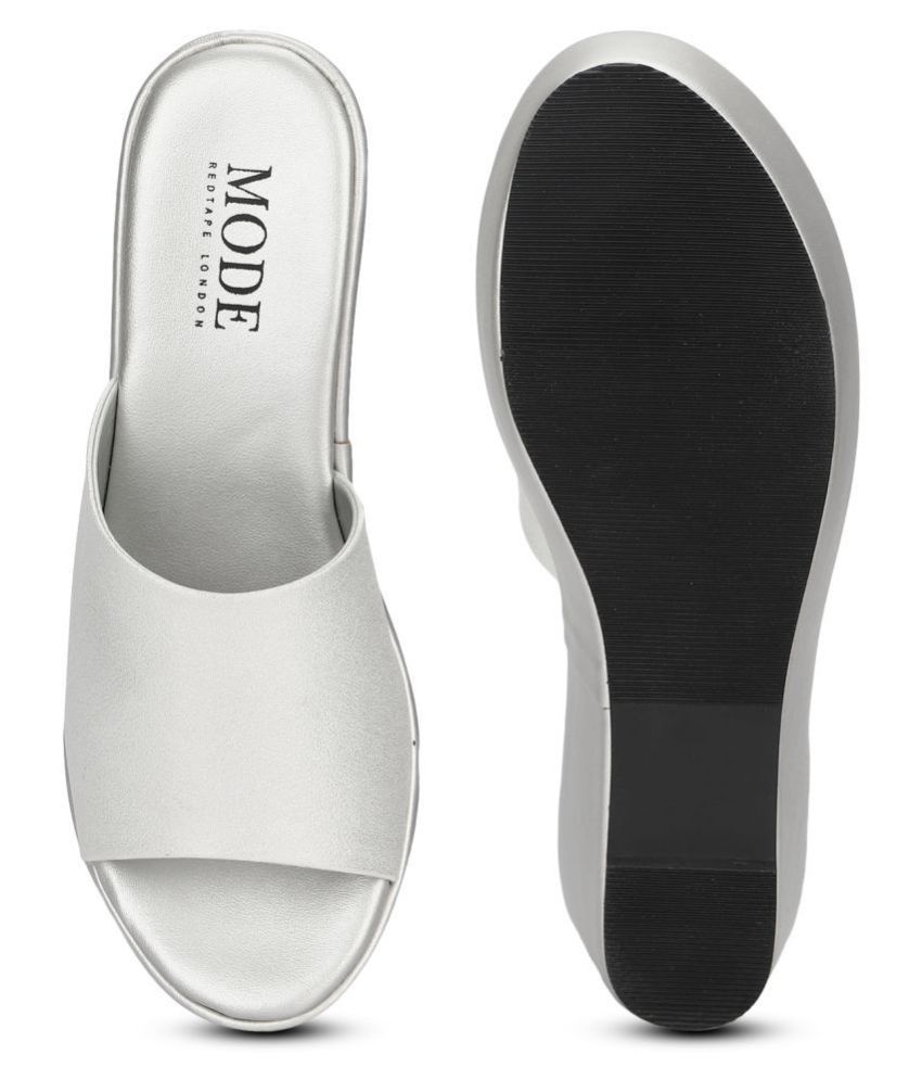 mode by red tape pumps