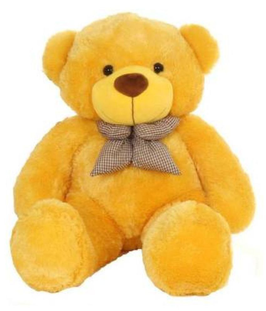 white and yellow teddy bear