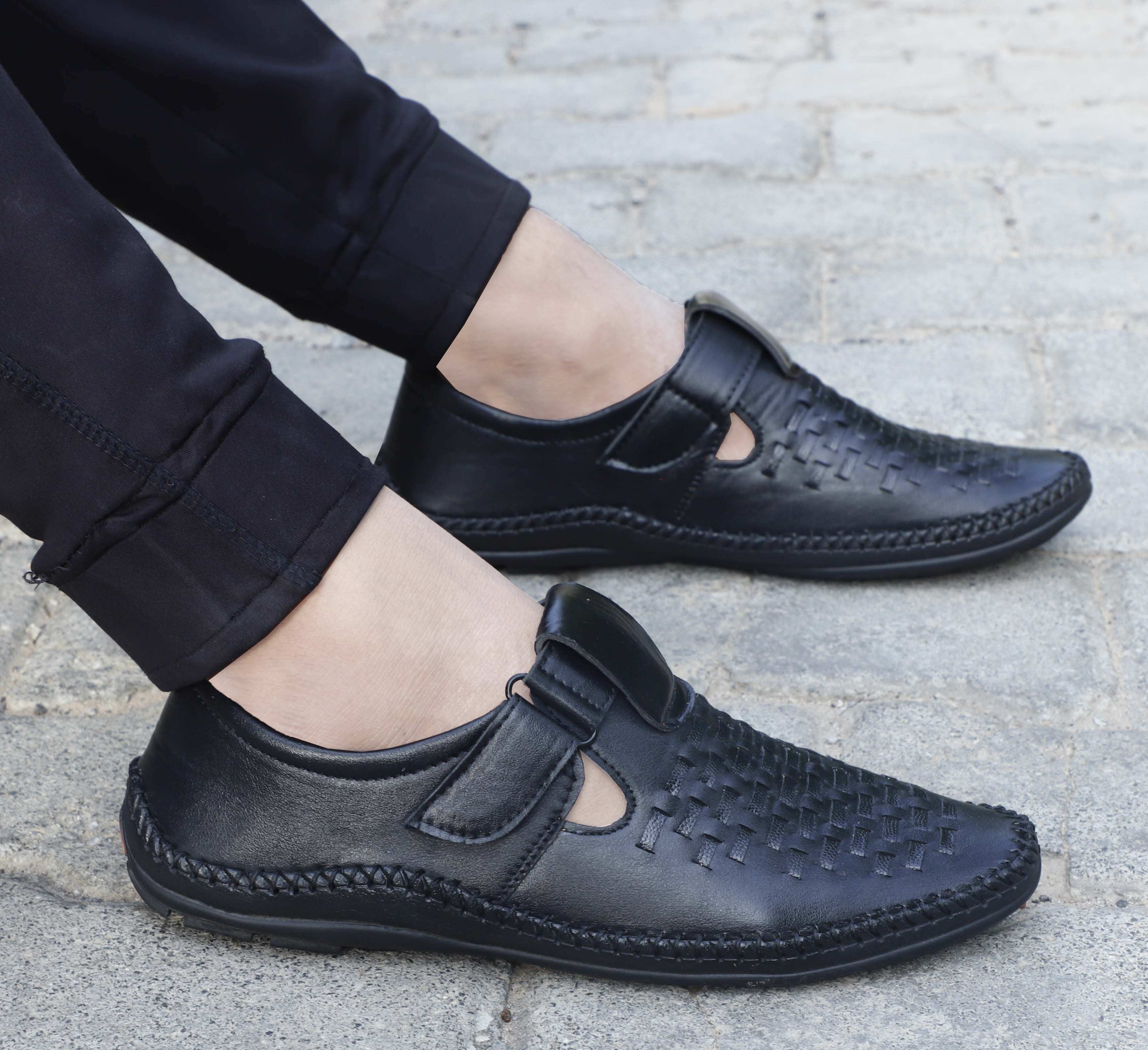 Aadi Black Synthetic Leather Sandals