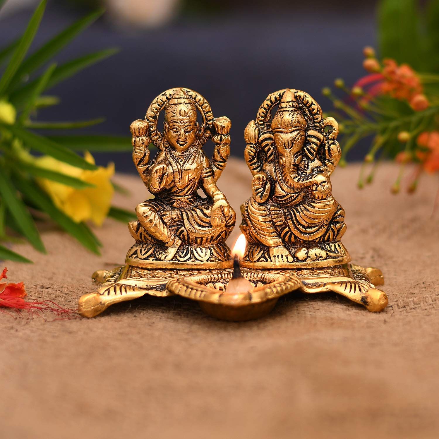     			Metal Gold Plated Laxmi Ganesh Chowki Diya God Idol (Gold, 15X10X12 cm)