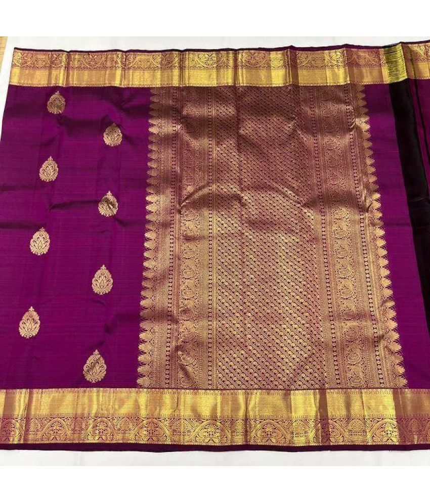     			KOMAL NX Pack of 1 Silk Blend Woven Saree With Blouse Piece ( Maroon )