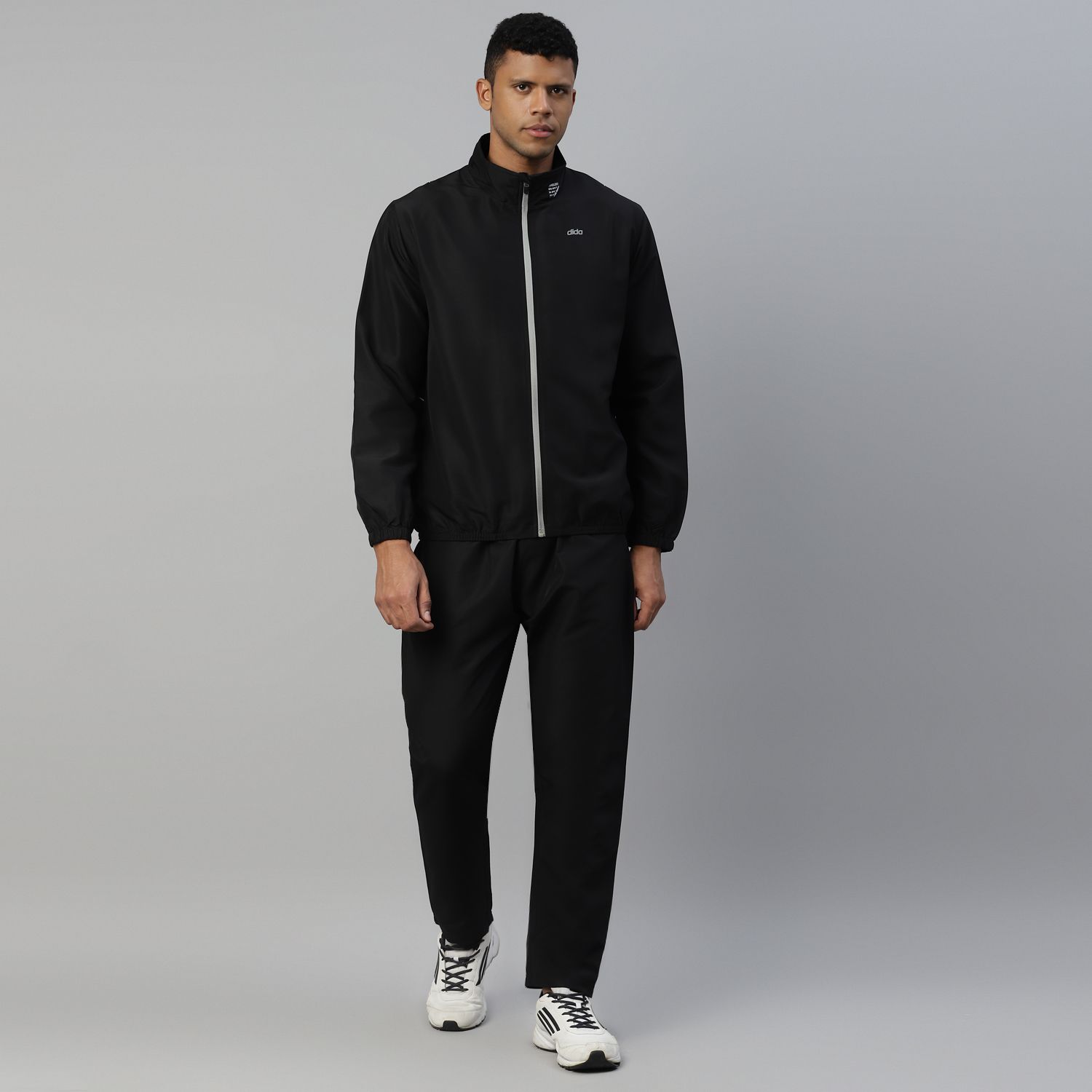     			Dida Sportswear Black Polyester Regular Fit Solid Men's Sports Tracksuit ( Pack of 1 )