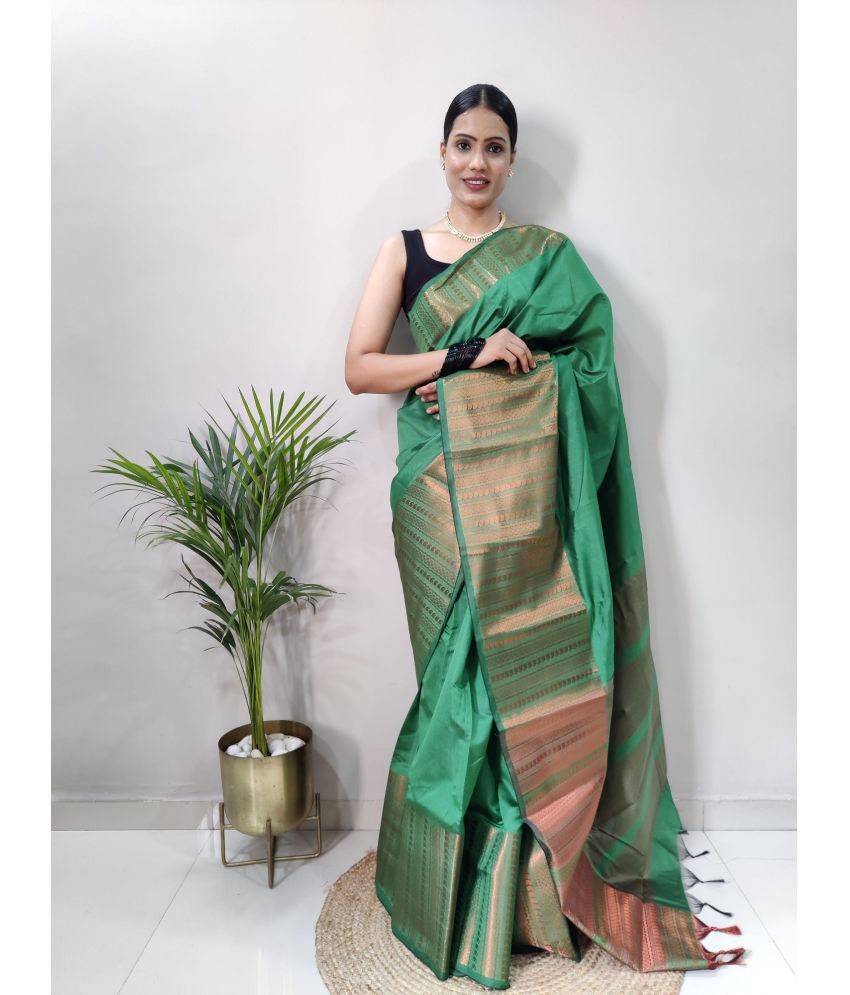     			Apnisha Banarasi Silk Embellished Saree With Blouse Piece - Green ( Pack of 1 )