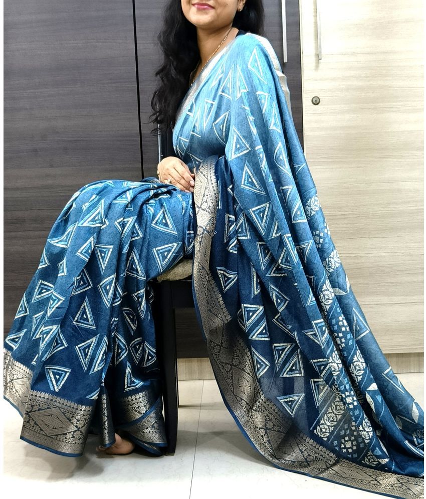     			NIKKARYA Silk Blend Woven Saree With Blouse Piece - Blue ( Pack of 1 )