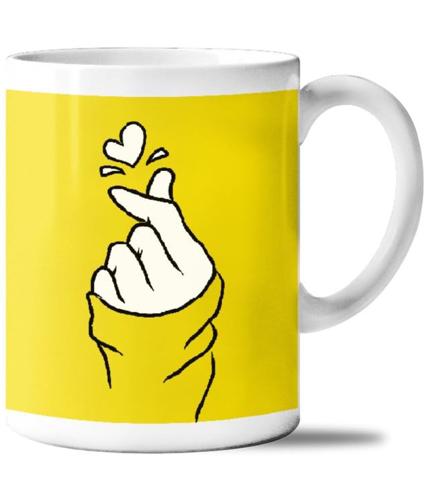     			iKraft Finger Heart Yellow Graphic Ceramic Coffee Mug 325 mL ( Pack of 1 )