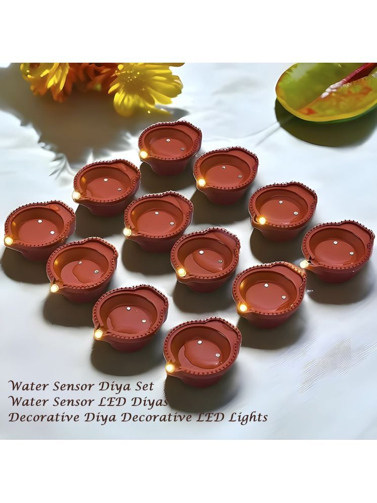     			Water Sensor Diya for Home Decoration - 12 Pcs Electric Flameless & Smokeless LE Tan 1Mtr Electric Diya ( Pack of 1 )